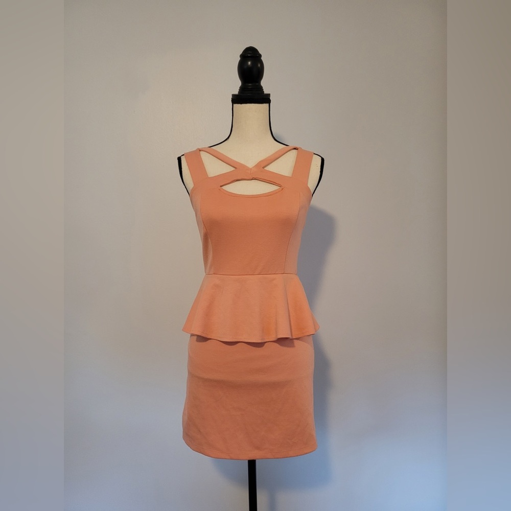 Coral strappy peplum cocktail dress